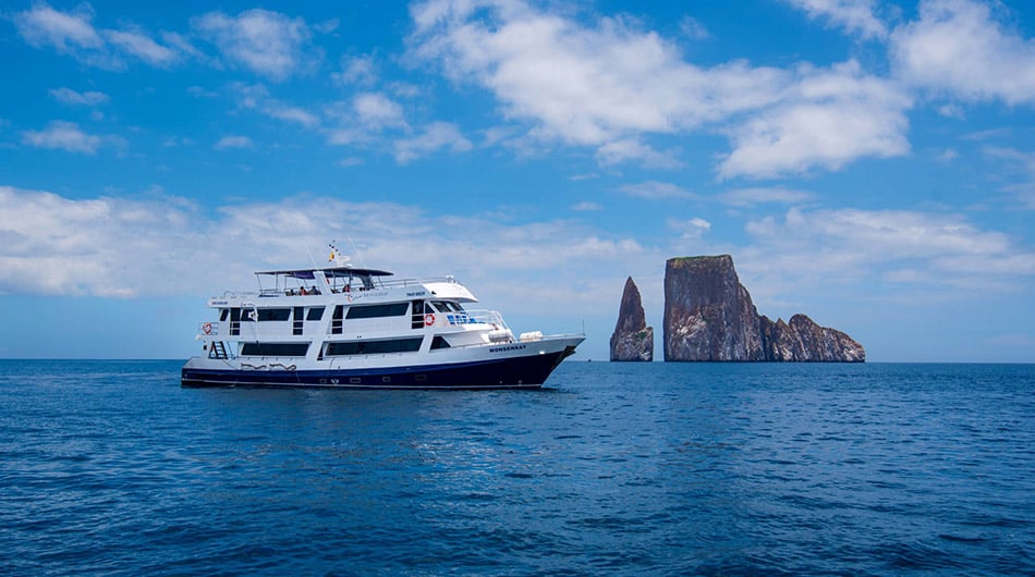 Monserrat Galapagos Cruise Ship Infront of Kicker Rock Monserrat Galapagos Cruise Ship Infront of Kicker Rock
