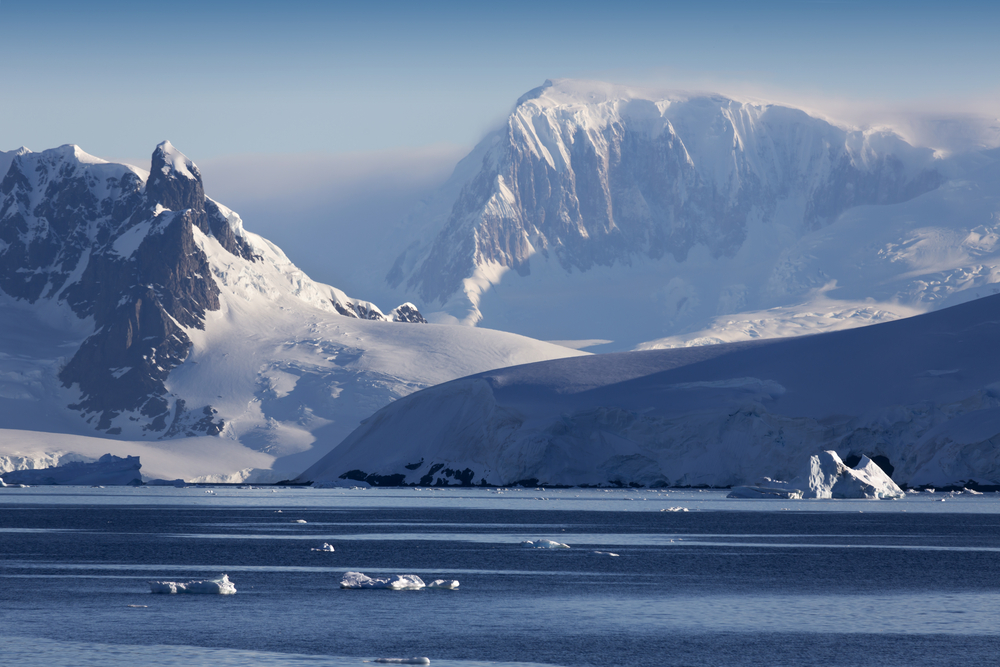 Snow capped mountains antarctic peninsula snow capped mountains antarctic peninsula