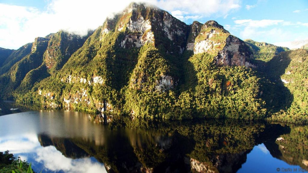 rocky mountains reflecting in water rocky mountains reflecting in water