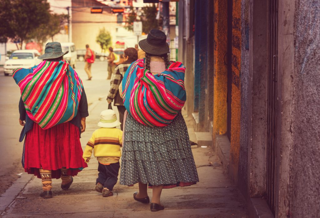 women walking in La Paz, Bolivia women walking in La Paz, Bolivia