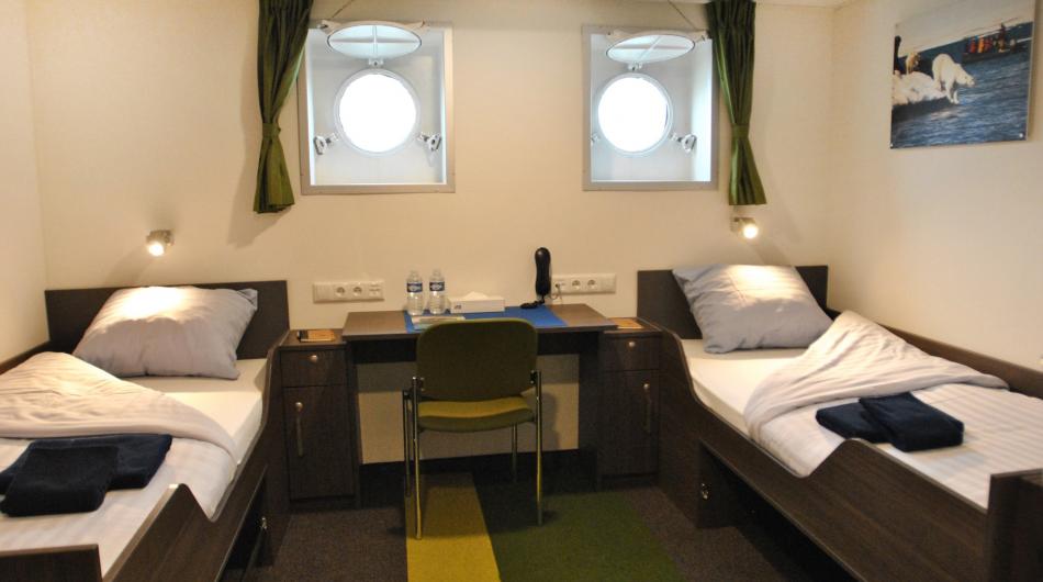 Ortelius Twin Porthole Cabin