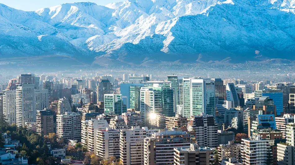Santiago de Chile panoramic city view with snowy mountains peaks