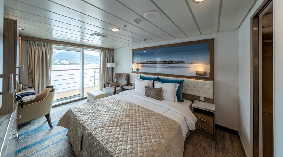 Sleeping area of the Captain's Suite on Greg Mortimer