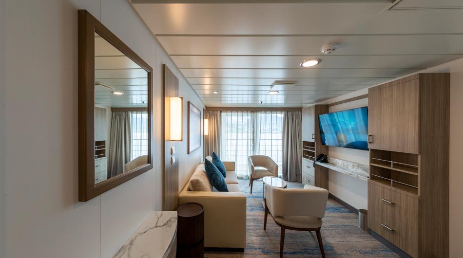 Living area of the Captain's Suite on Greg Mortimer