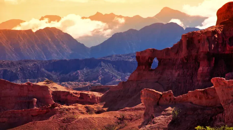 Cafayate red mountains with orange sunset