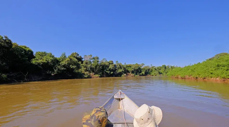 Two tourists in boat on Aquidauana River