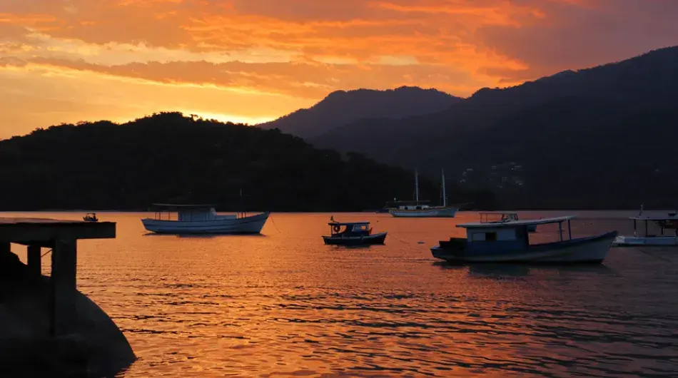 Sunset over the ocean in Paraty