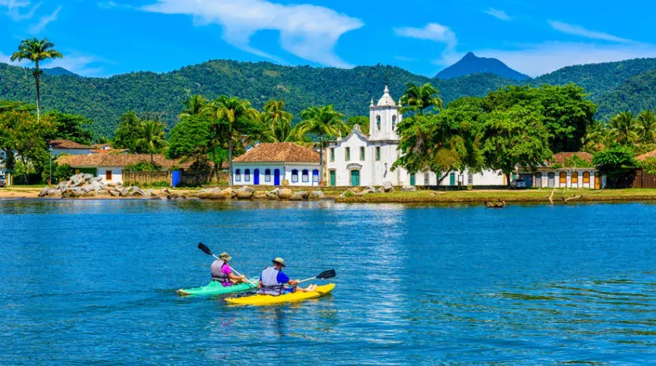 Paraty town view from sea with kayak