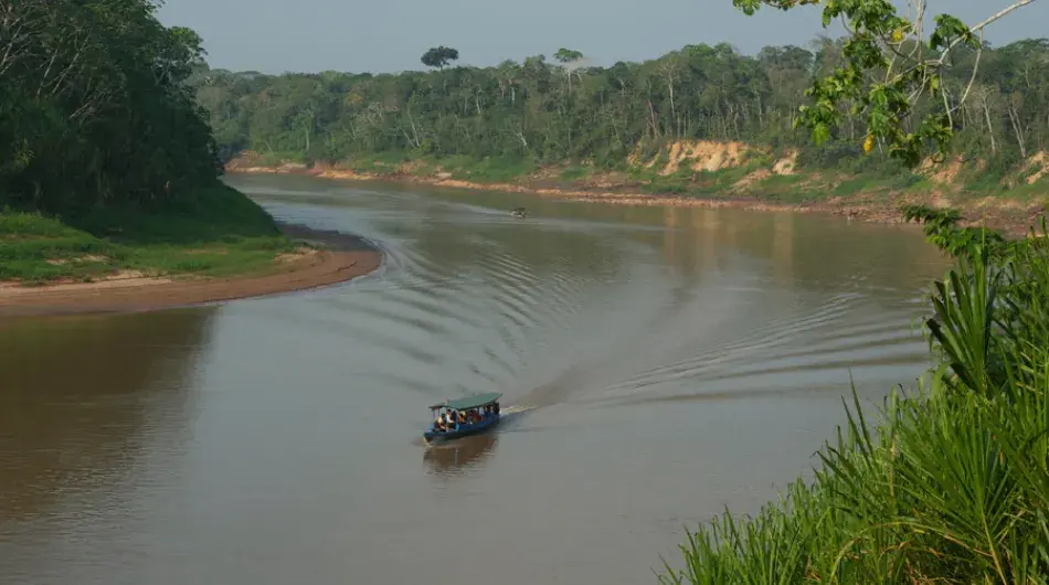Tambopata river boat with tourists