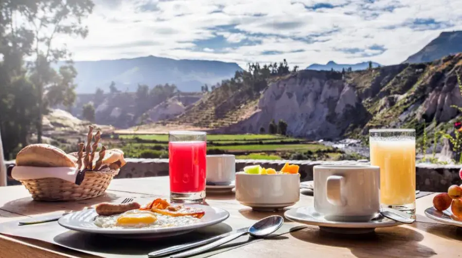 Breakfast in front of colca canyon landscape