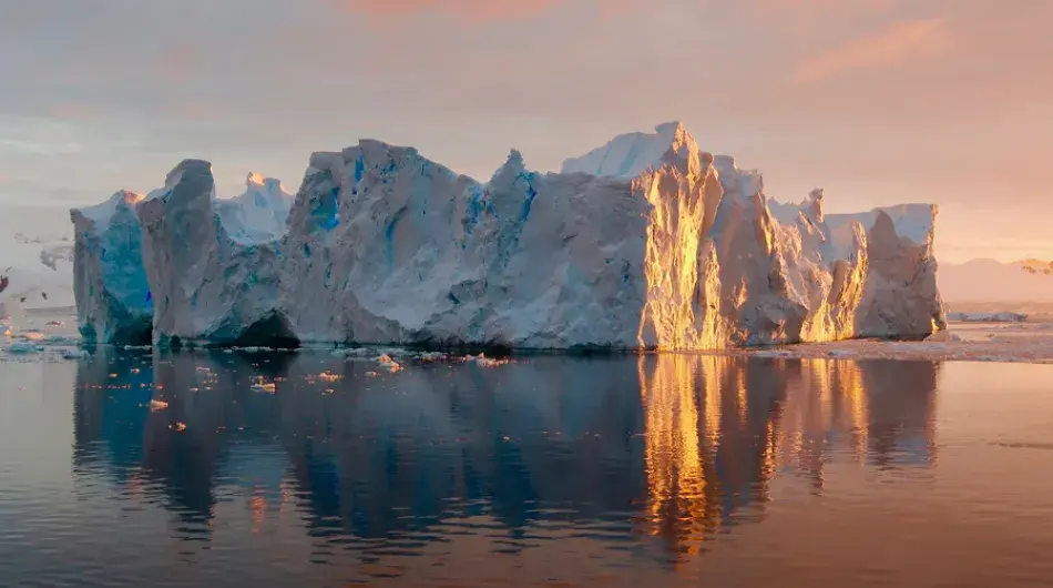 Big iceberg in Antarctica at sunrise