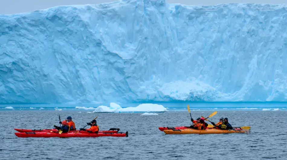 kayaking in front of iceberg, Antarctica 