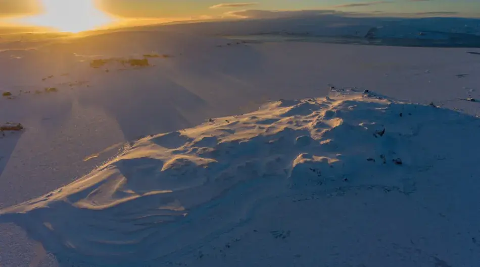 Aerial view of an icy sunset over King George Island in Antarctica