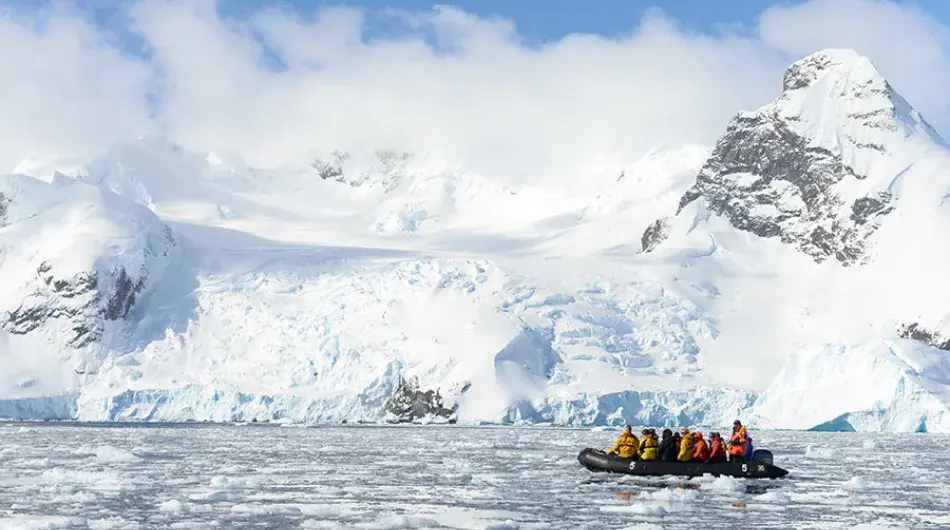 zodiac cruising in ice choked water in Antarctica