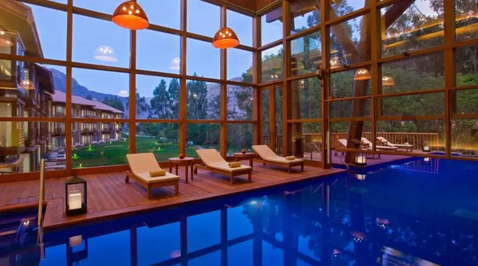 Tambo del Inka luxury collection hotel swimming pool with mountain view