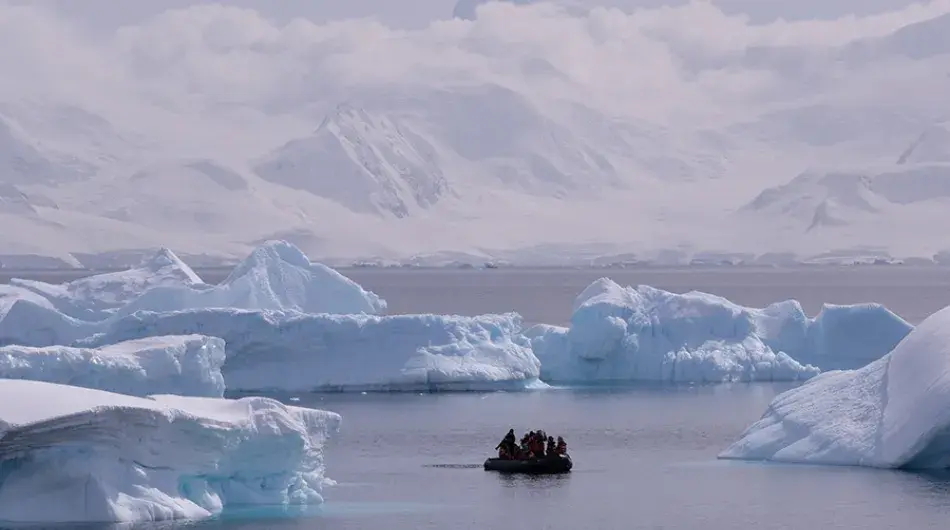Zodiac cruising around Cuverville Island in Antarctica