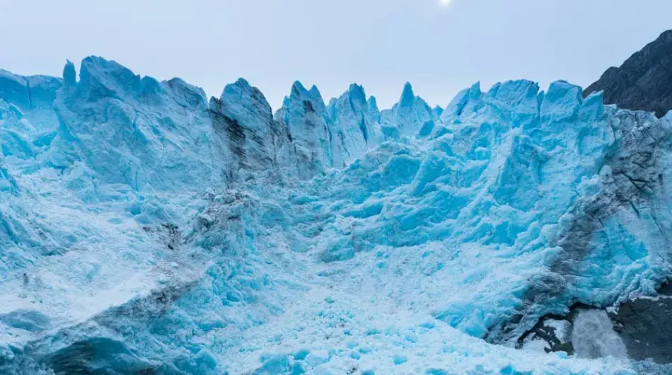 the blue ice of the Condor Glacier in Agostini Sound within Chilean Patagonia