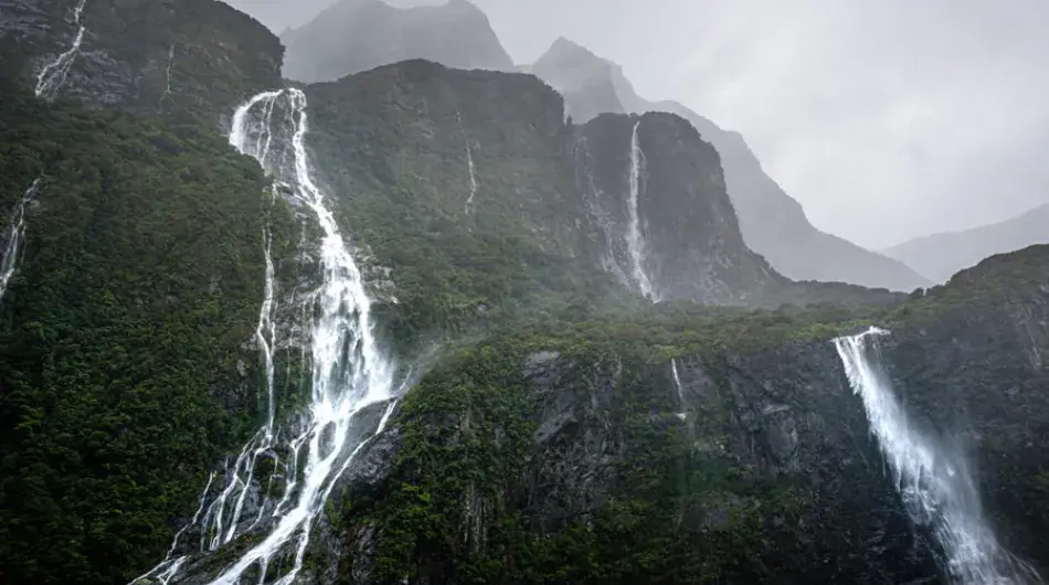 Scenic view of Waterfalls in the fog, Milford sound