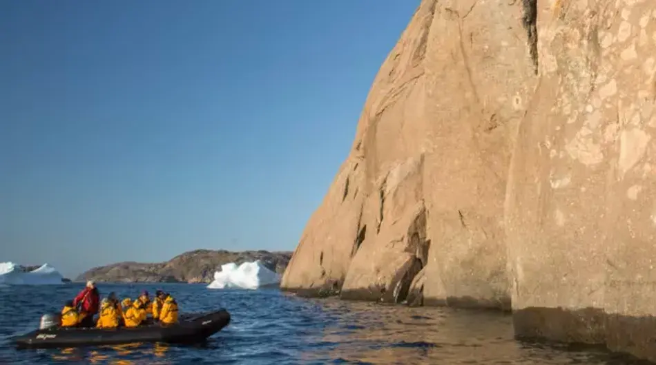 Quark tourists zodiac cruising