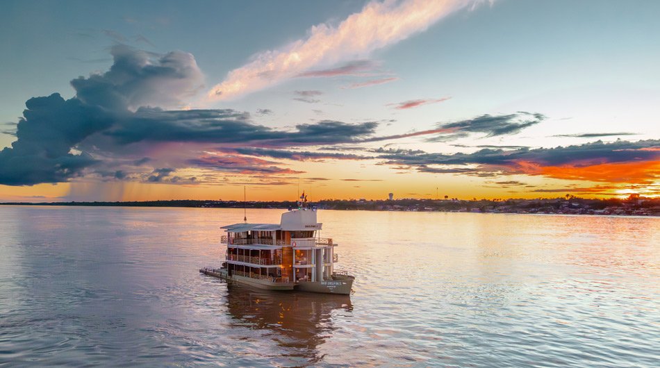 Delfin 1 exterior at sunset