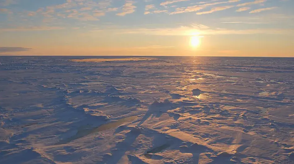 Beautiful sunset over compacted sea ice in the North Pole