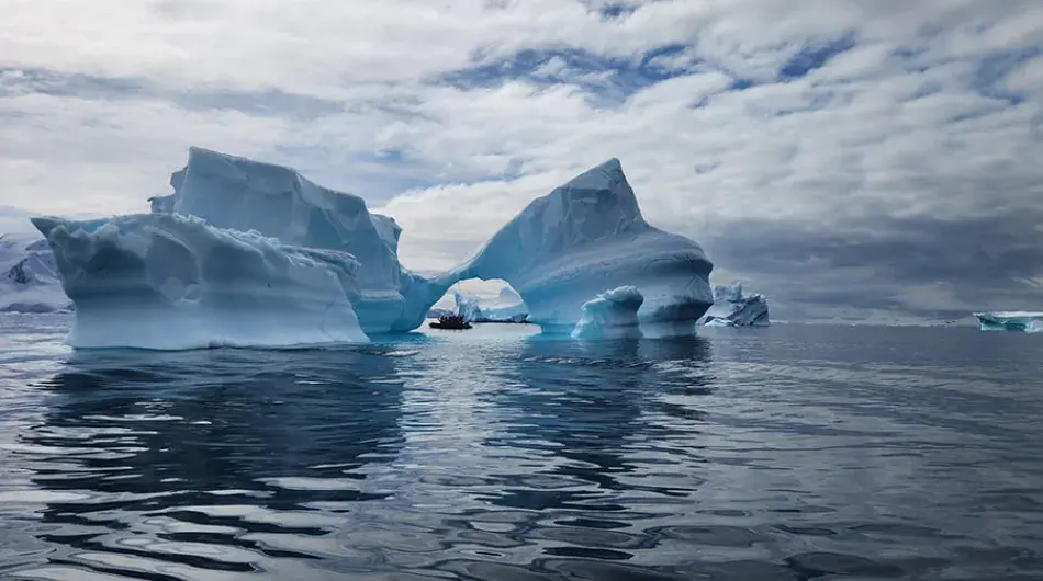 Icebergs and zodiacs in Antarctica