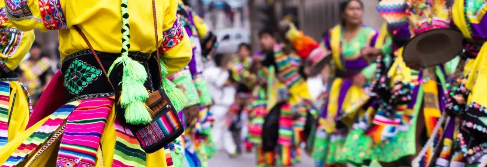 Peru_Dancers_shutterstock_145366180-e1582852675724.jpg