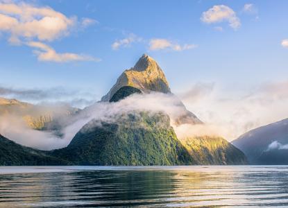 mountains and calm waters of Milford Sound in New Zealand) 