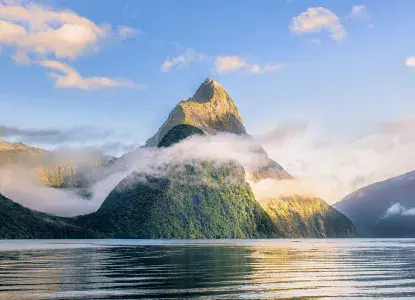 mountains and calm waters of Milford Sound in New Zealand) 