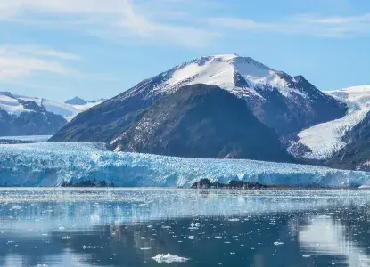 Pia Glacier in Patagonia with Darwin Mountains and calm waters) 