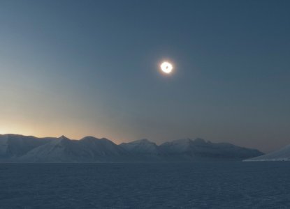 Panoramic view of Arctic landscape with solar eclipse) 
