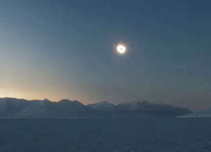 Panoramic view of Arctic landscape with solar eclipse) 