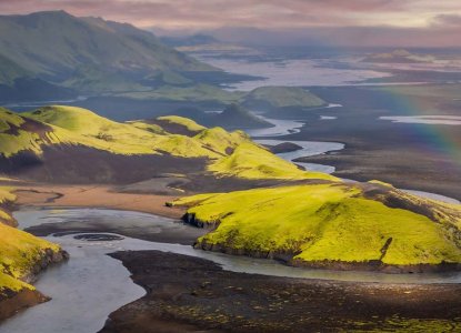 Aerial View of Iceland's volcanic terrain covered in moss) 