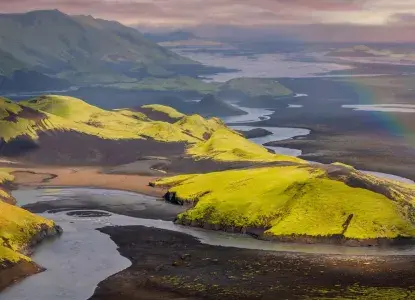 Aerial View of Iceland's volcanic terrain covered in moss) 